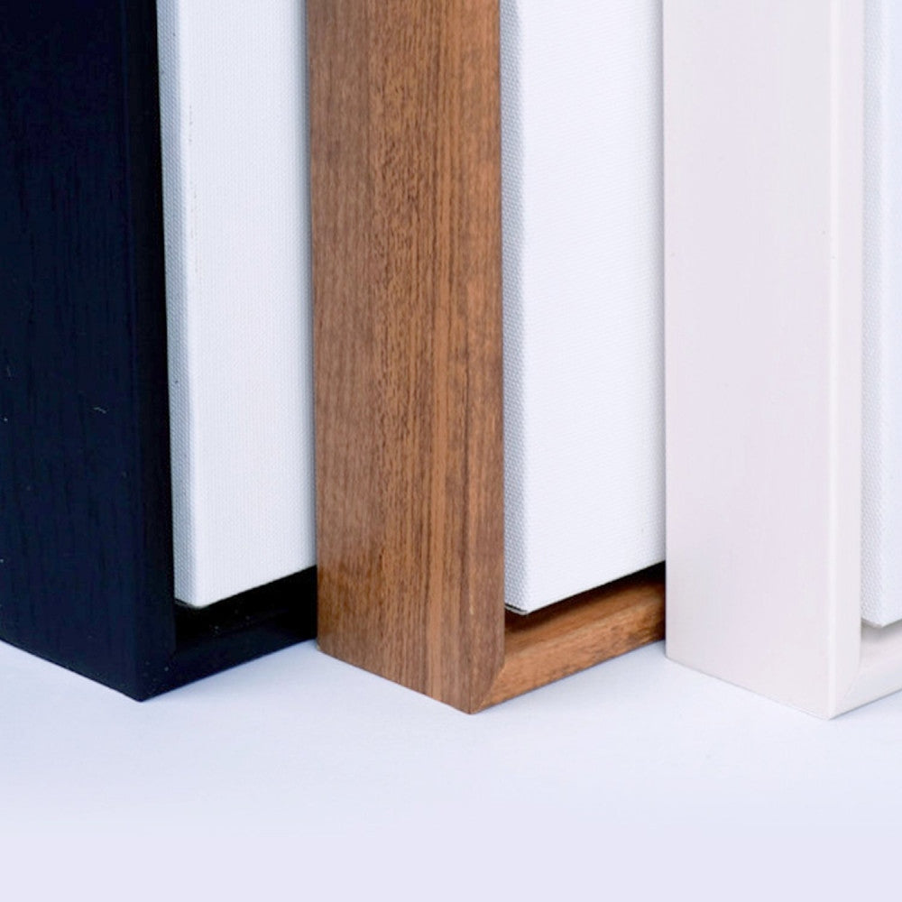 Framed Canvas frame color options — Black, Wood, and White